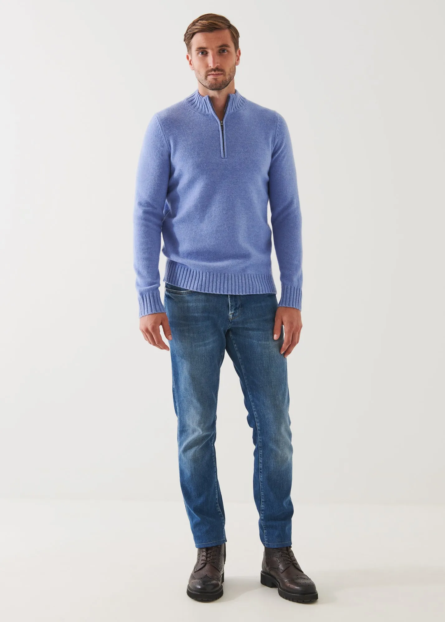 MERINO QUARTER ZIP SWEATER